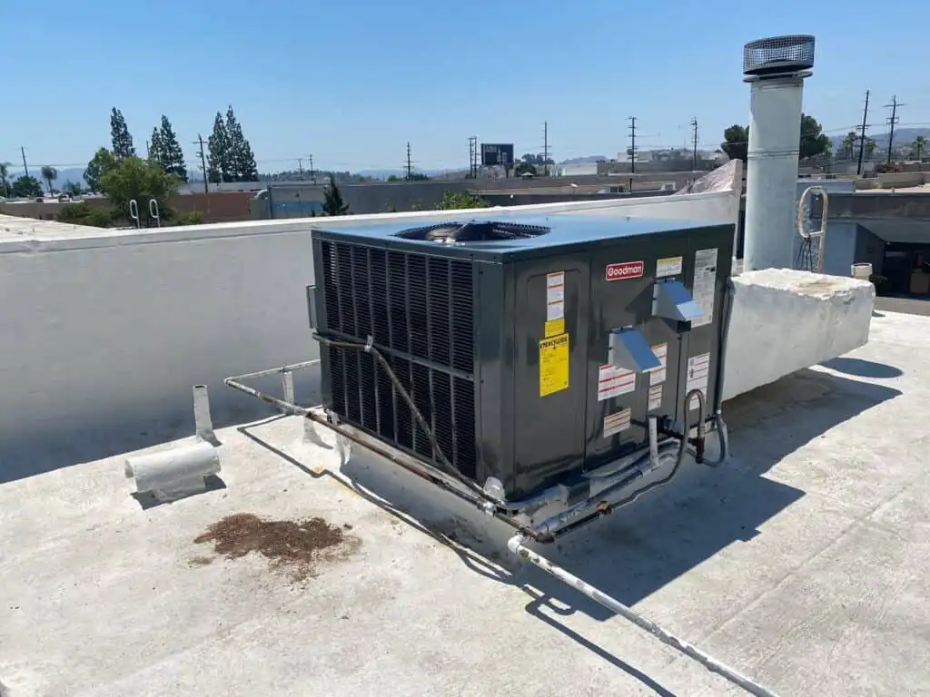 High-efficiency Goodman air conditioning unit installed on a Los Angeles rooftop.