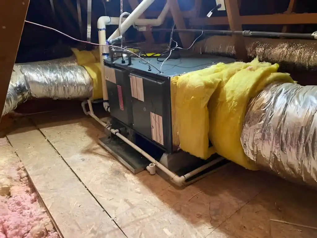 HVAC ductwork installation in attic for heating and cooling system, Los Angeles area.