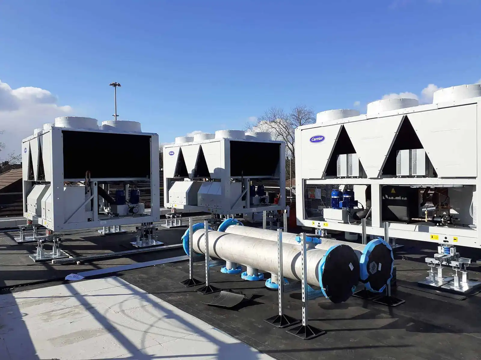 HVAC rooftop units on a commercial building in Los Angeles, ready for installation.