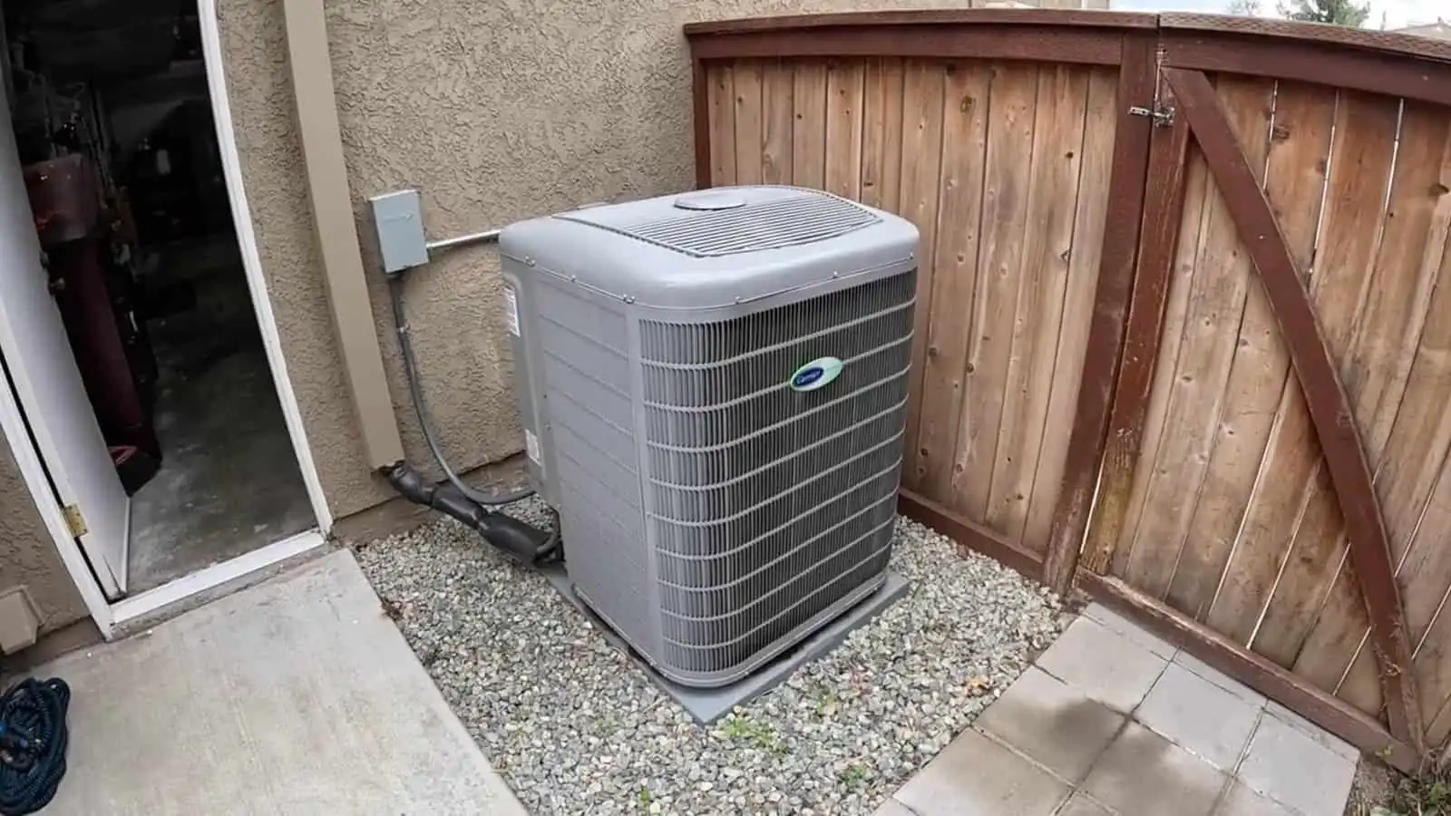 High-efficiency outdoor HVAC unit installed on a gravel pad in Los Angeles, CA.