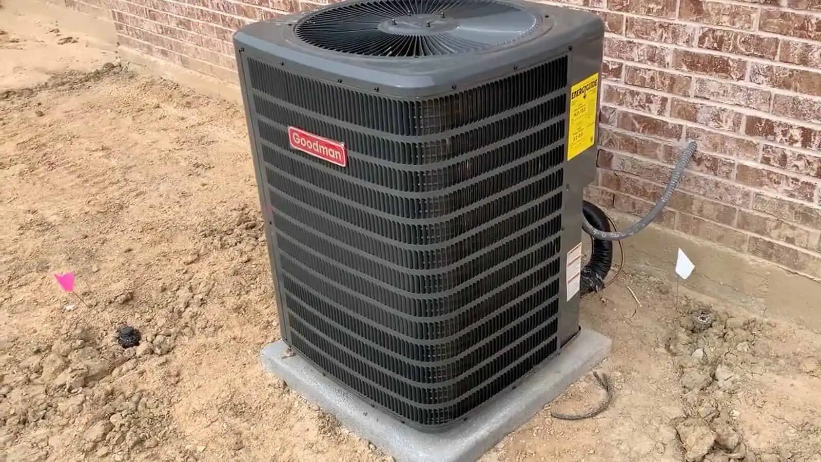 High-efficiency Goodman outdoor AC unit installed outside a home in Los Angeles, CA.