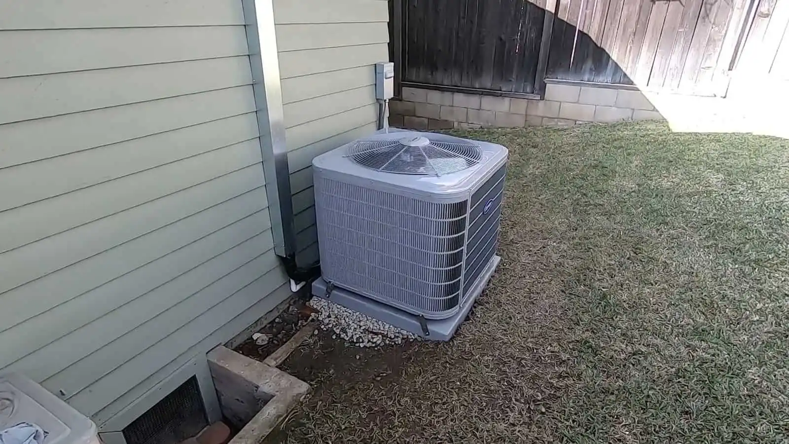 Outdoor heat pump unit for efficient climate control.