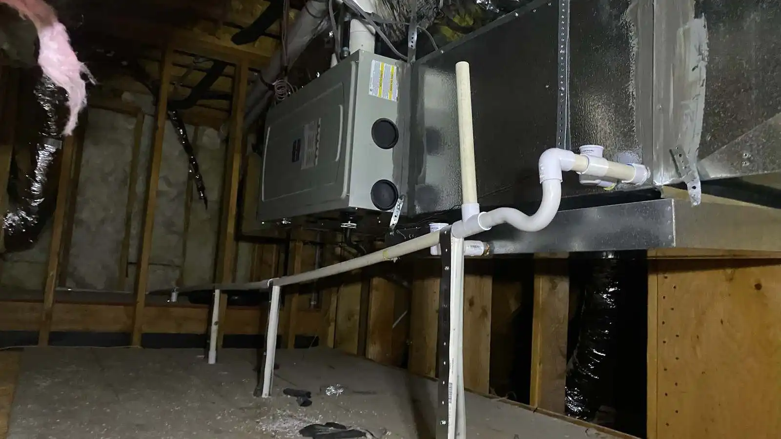 A cleanly installed air handler and ductwork after a heat pump service