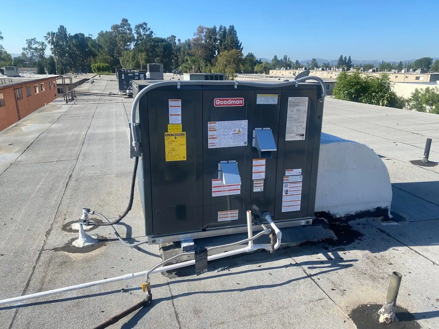 Commercial rooftop package unit on a flat roof